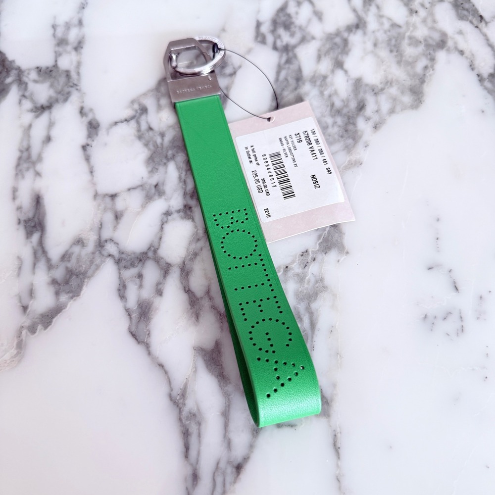 Bottega Veneta perforated logo leather keychain in Green